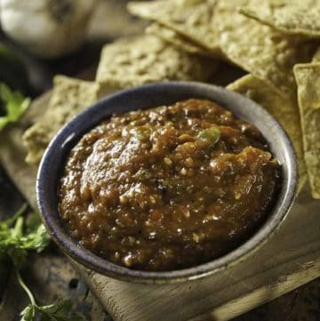 A bowl of homemade mexican hot sauce and tortilla chips