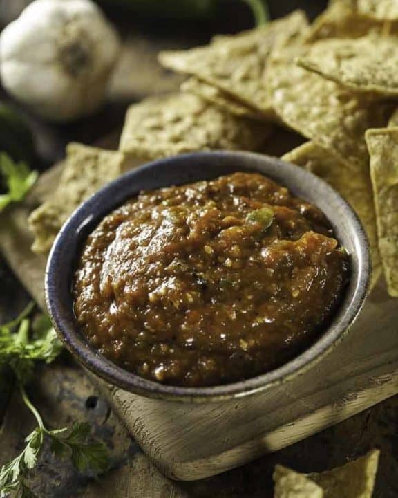 A bowl of homemade mexican hot sauce and tortilla chips