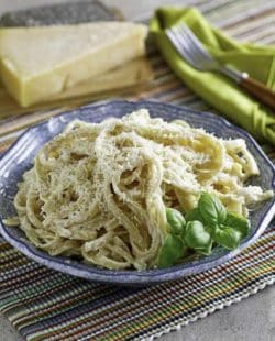 A bowl of pasta with homemade Olive Garden Alfredo sauce.