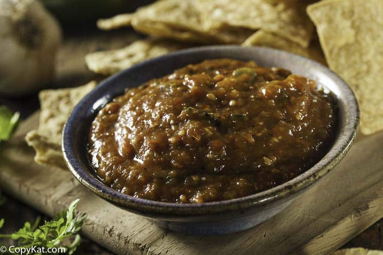 A small bowl of homemade Mexican hot sauce and tortilla chips