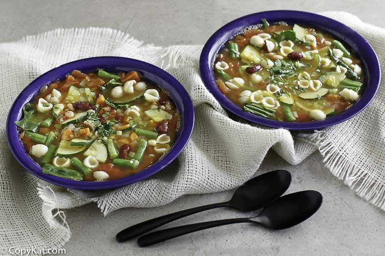 Two bowls of vegetarian minestrone soup