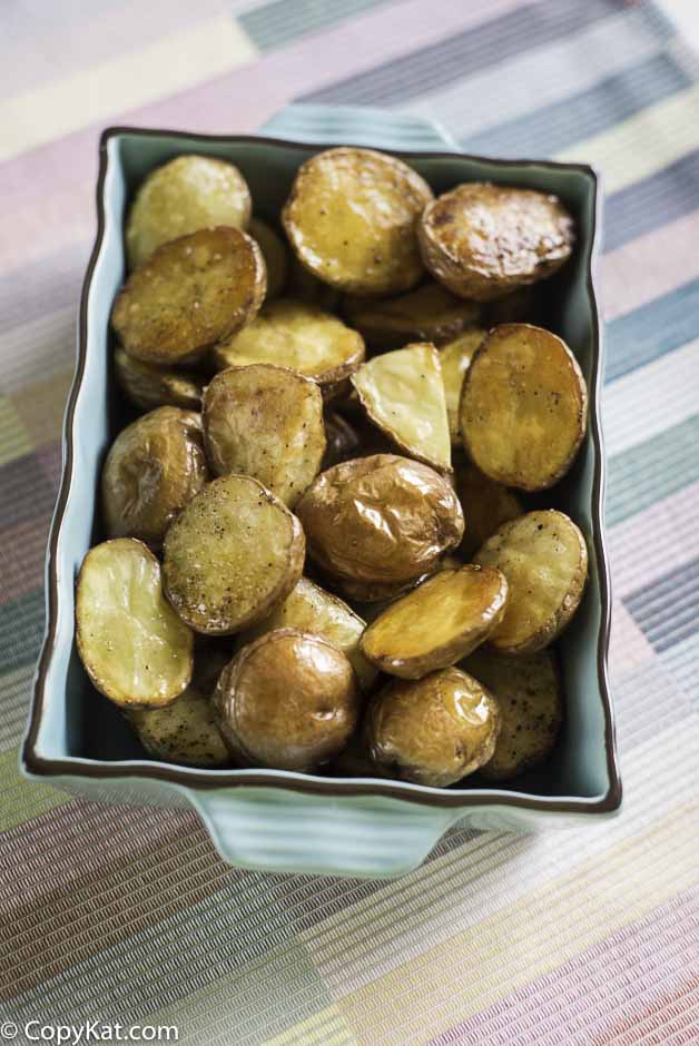 A dish of roasted new potatoes