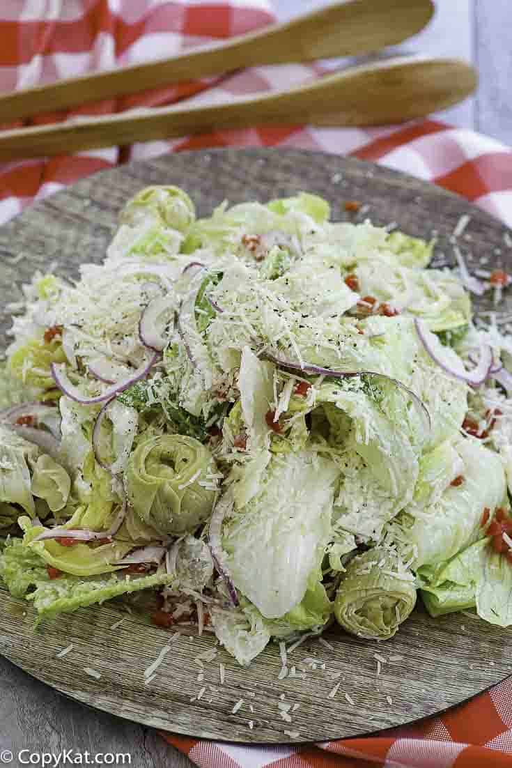 salad with romain and iceberg lettuce, artichokes and more