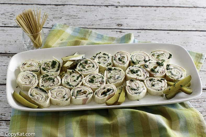 a platter of ham and cheese pinwheels