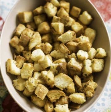 a bowl of homemade crispy buttery croutons