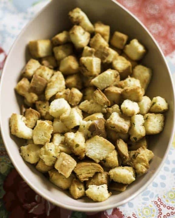 a bowl of homemade crispy buttery croutons