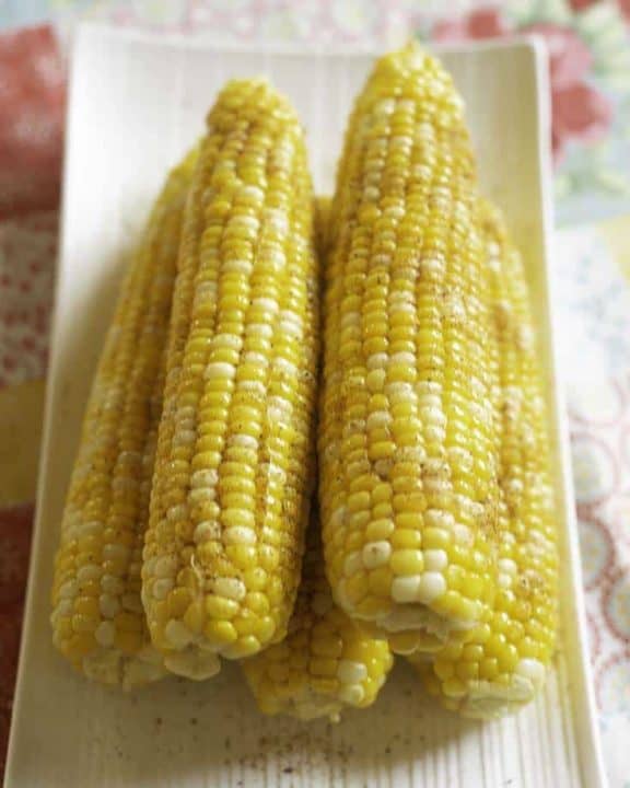 Homemade Red Lobster Chesapeake Corn on the Cob on a serving platter.