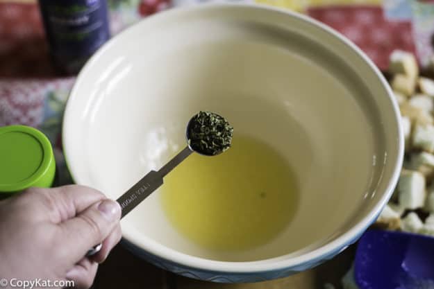 melted butter in a bowl with sesaonings 