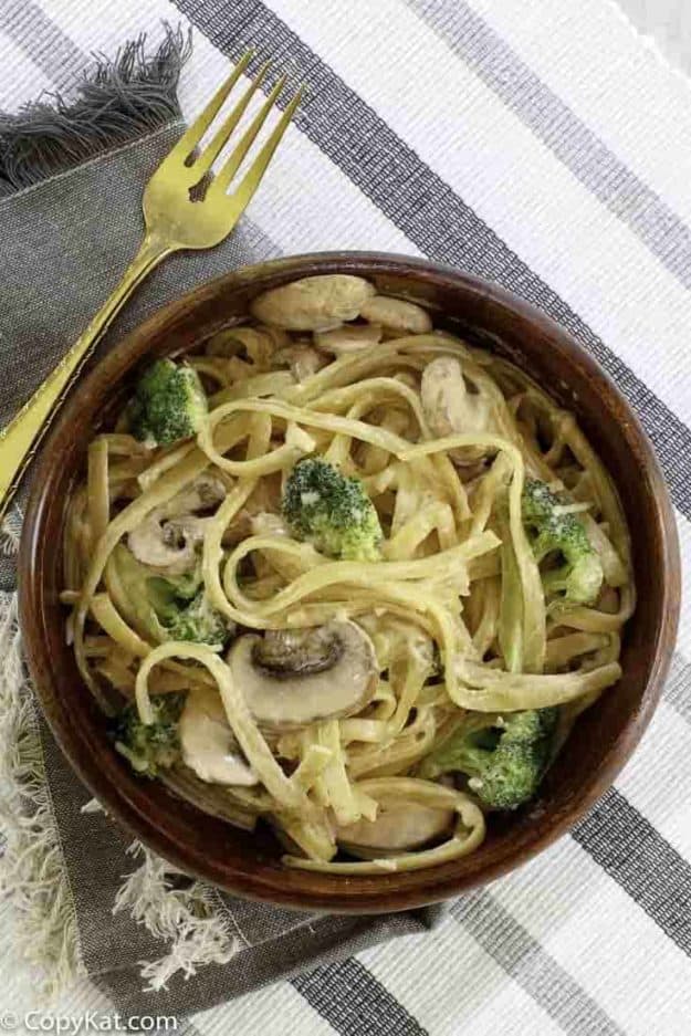 a bowl of broccoli pasta