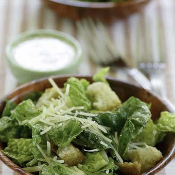Homemade copycat Outback Steakhouse caesar salad served with homemade caesar salad dressing
