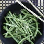 fresh green beans with garlic butter in a bowl
