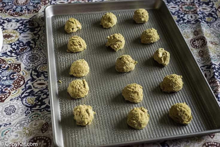 ginger snap cookie dough on a baking sheet