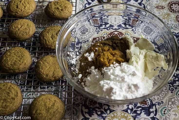 mixing together pumpkin pie dip