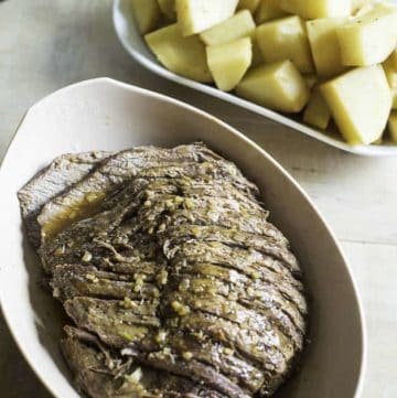 a perfectly seasoned and tender roast beef cooked in a pressure cooker