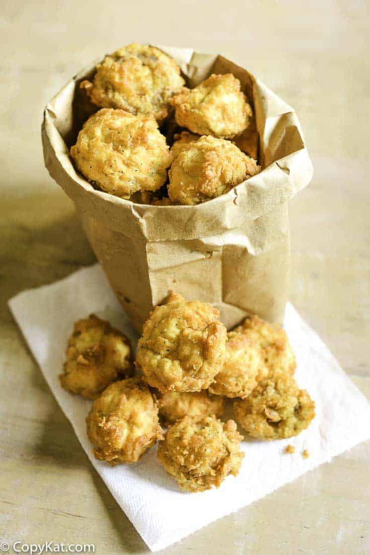 deep fried fresh mushrooms in a paper bag