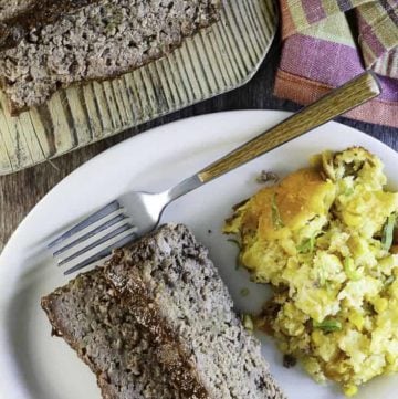 two slices of homemade meatloaf on a plate