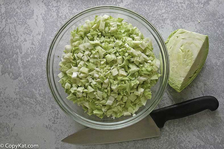 a bowl of cut cabbage