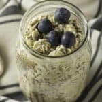 overnight oatmeal made with oatmeal, chia seeds, almond milk, peanut butter, and blueberries