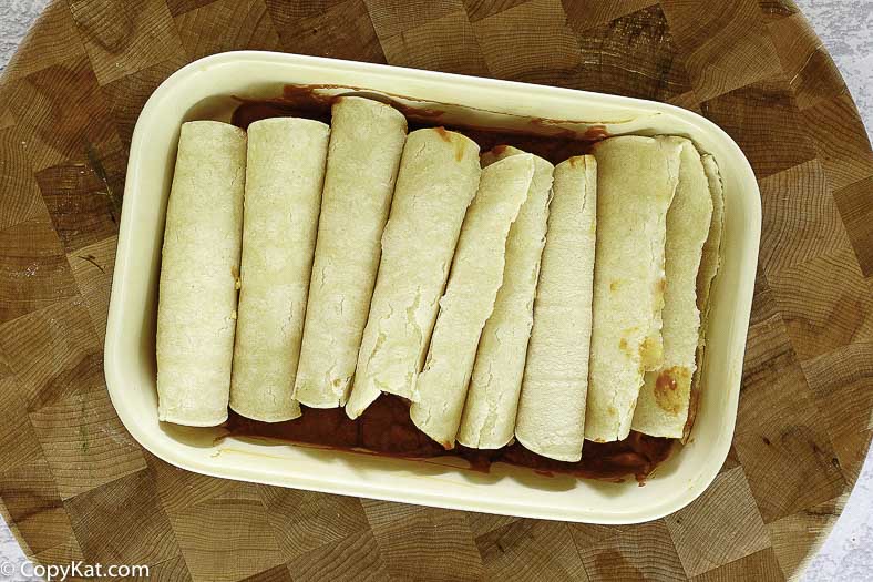 Rolled enchiladas in a pan