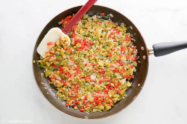 cooked chopped vegetables in a skillet