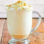 caramel cappuccino in a glass mug