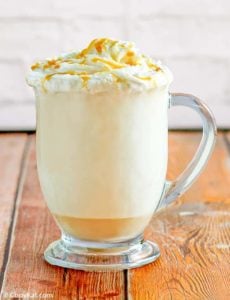caramel cappuccino in a glass mug
