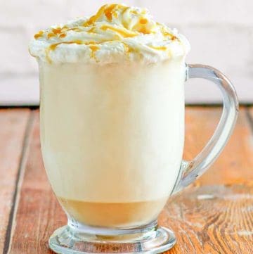 caramel cappuccino in a glass mug