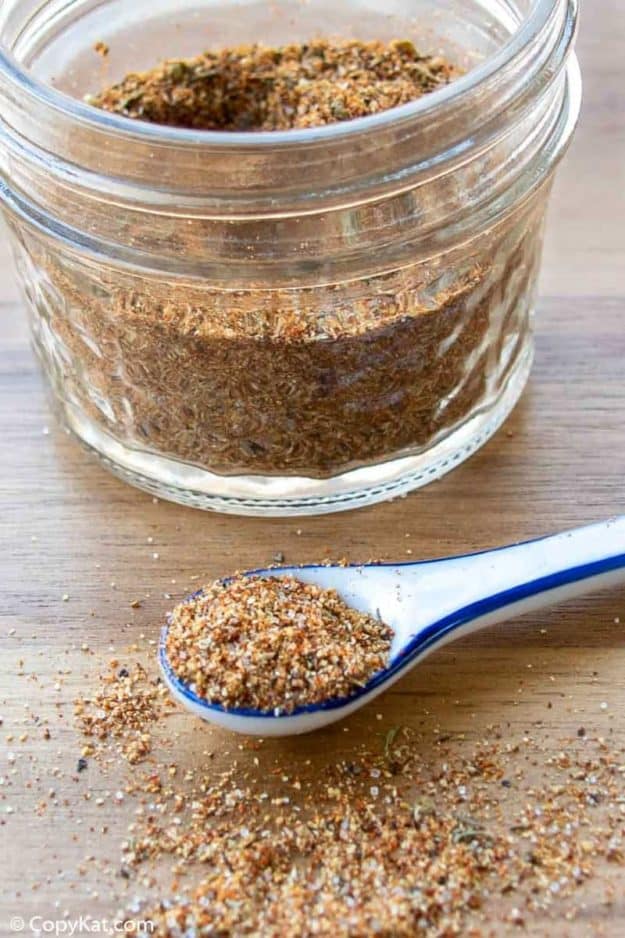 Red Lobster Cajun Spice Seasoning Mix in a measuring spoon and glass jar