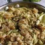 a skillet of garlic shrimp pasta