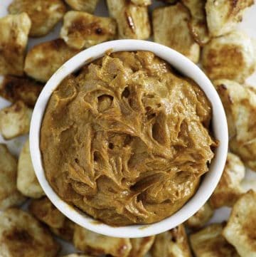 a bowl of homemade yum-yum sauce with grilled chicken