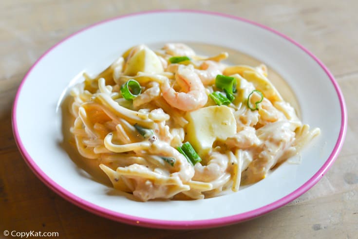 a bowl of shrimp and pasta salad