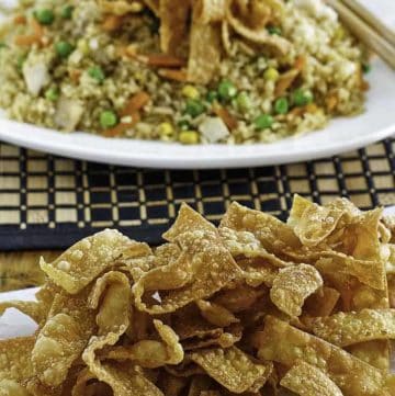 crispy fried wonton strips on a plate