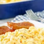 a plate of macaroni and cheese and meatloaf