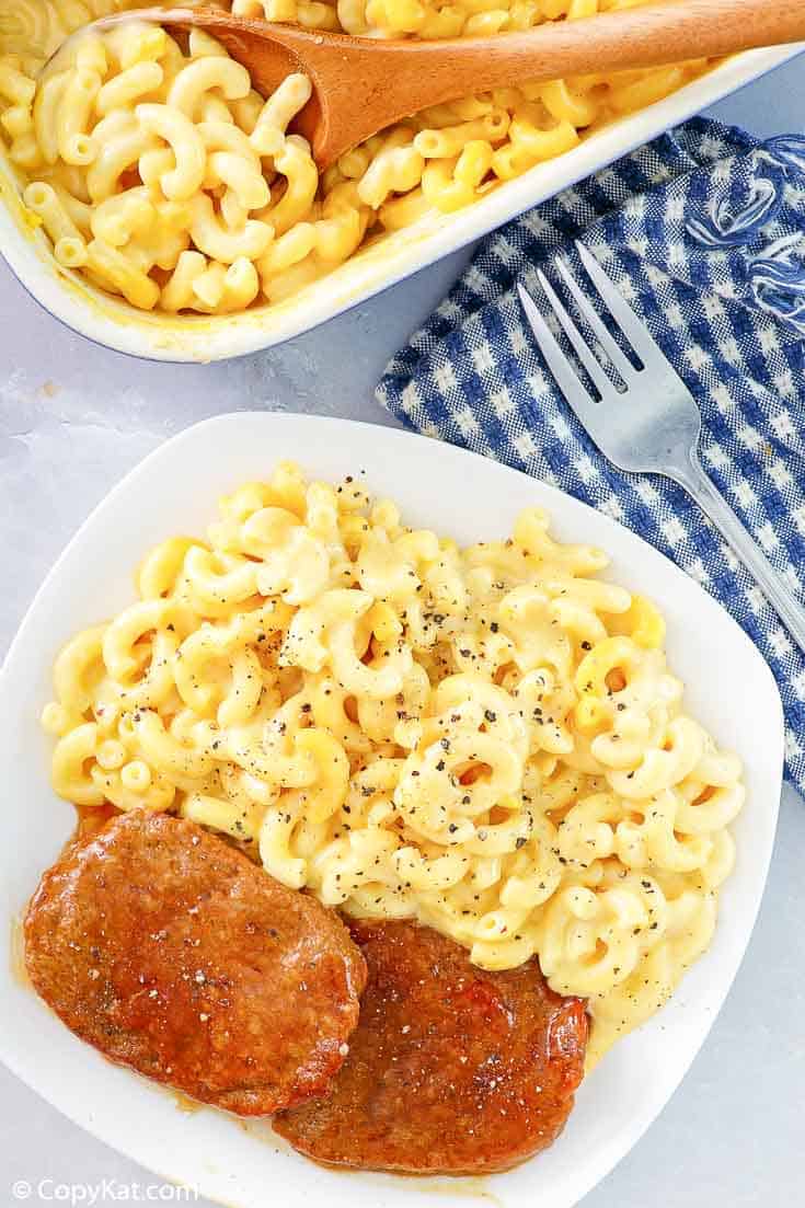 macaroni and cheese and meatloaf on a white plate