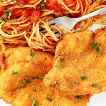 Romano cheese crusted chicken and pasta with marinara