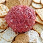 Dried beef cheese ball and crackers on a platter