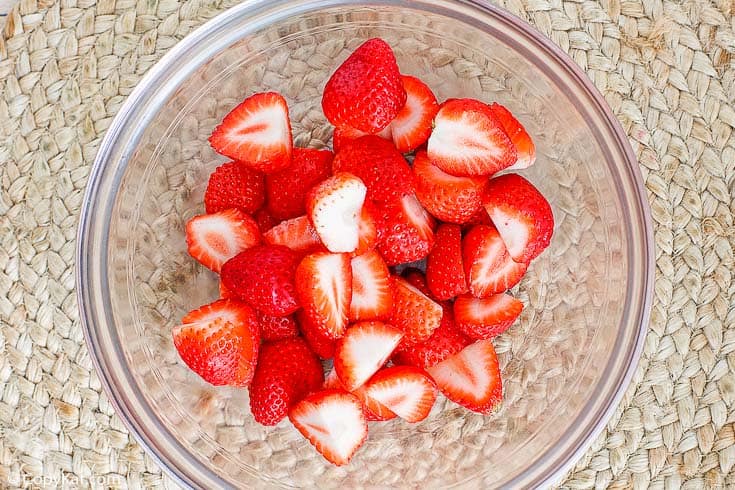 fresh strawberries in a glass bowl