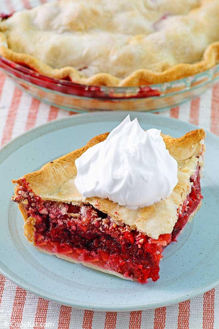 fruit of the forest pie with a dollop of whipped cream