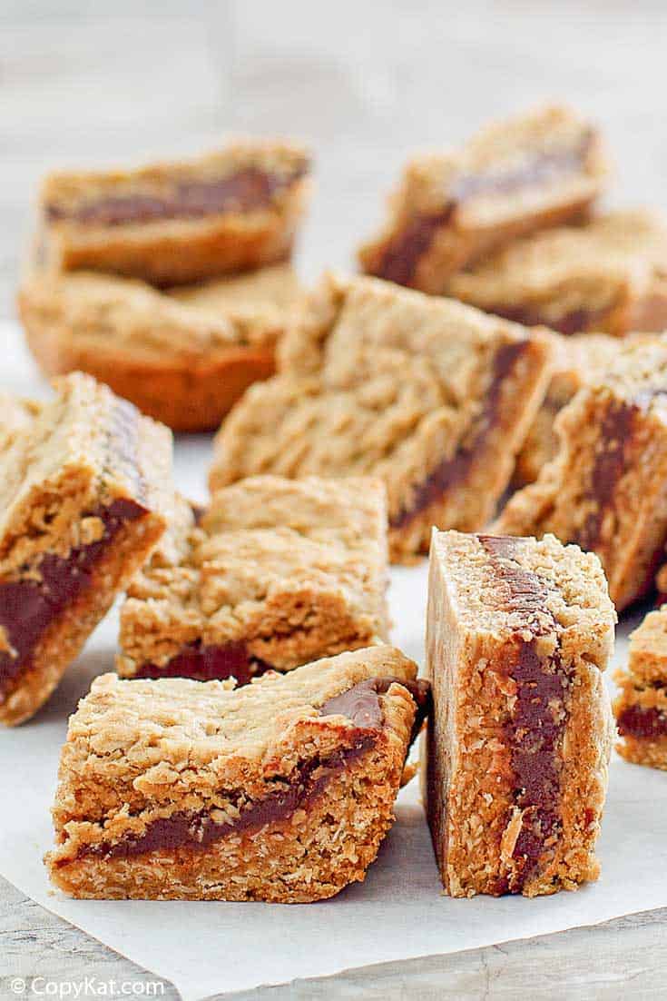 several fudge jumbles cookie bars on top of parchment paper