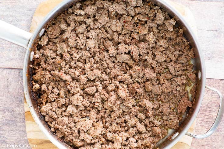 cooked crumbled meat in a skillet