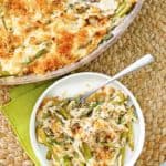 Swiss asparagus casserole in a skillet and a bowl
