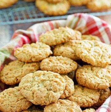 a basket filled with oatmeal coconut crunchies cookies