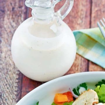 a bottle of homemade Old Spaghetti Factory creamy pesto dressing