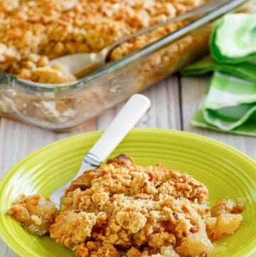 apple crisp in a baking dish and on a plate