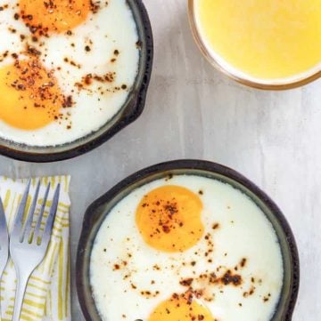 oven fried eggs in cast iron skillets