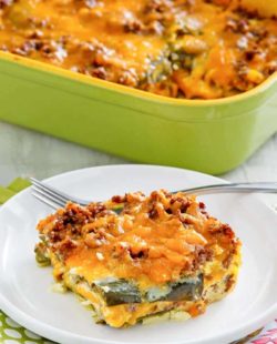 a serving of chili relleno casserole with beef in front of the casserole