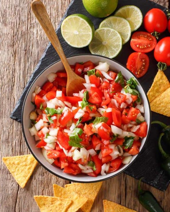 fresh pico de gallo, tortilla chips, lime, tomatoes, and peppers