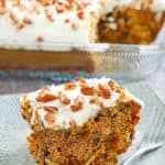 a slice of carrot cake with cream cheese frosting