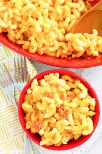 homemade Luby's macaroni and cheese in a serving dish and small bowl