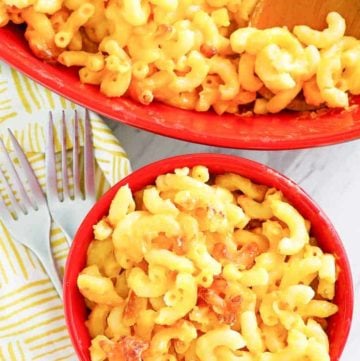 homemade Luby's macaroni and cheese in a serving dish and small bowl